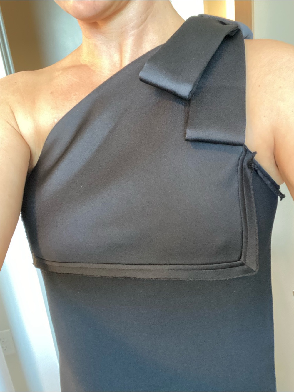 St. John luxury black dress in women’s size 6. Originally retailed for $2,295.